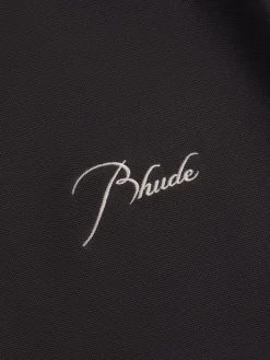 PIQUE SNAP SHORT SLEEVE POLO